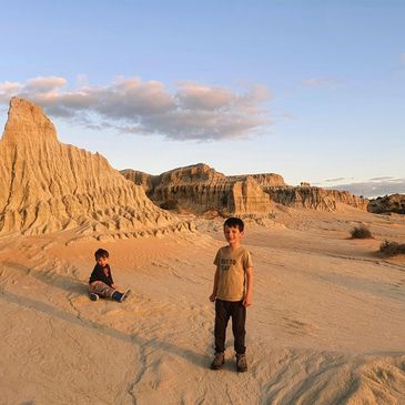 Kids playing outdoor in the sand 