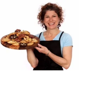 Curly Sue with a tray of cookies