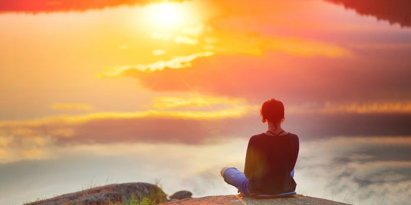 Woman looking at sunset- Addiction and dual diagnosis therapy for adults in Florida.