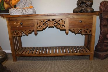 Handcarved Teak sideboard

Measurements are 