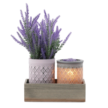 Warmer that looks a vase with a matching vase filled with faux lavender sprigs in a rustic wood box