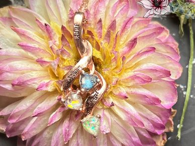 This necklace was for triplets, who were gone too soon, added chosen colors for each to their ashes.