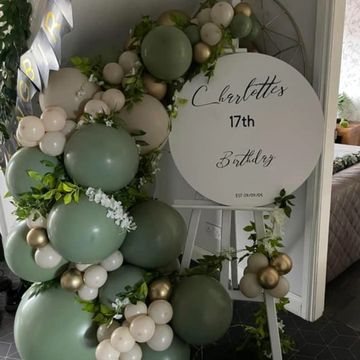 Sage Balloon and flower event sign.