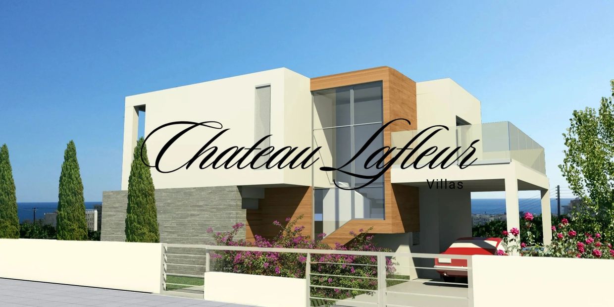 Modern villa with clean lines and ocean view under clear blue sky.