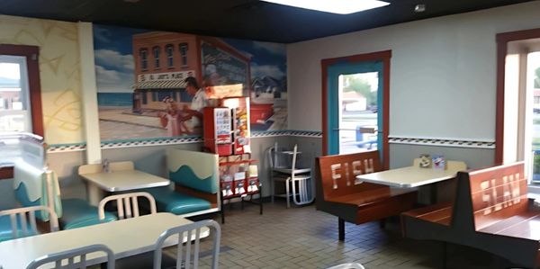 Sam's Seafood & Grill dining room and wall Muriel.