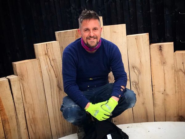 Dan Boorman man in hove building garden in Hove oak sleepers upright and curved with white concrete