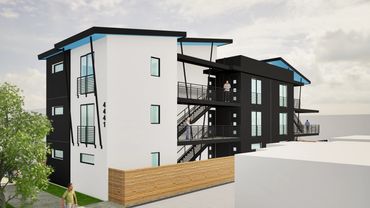 Modern three-story apartment building with balconies 