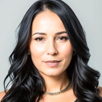 Hispanic real estate woman with long black hair and subtle makeup.