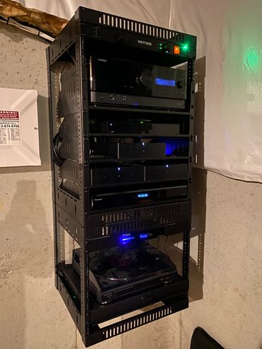 Custom AV equipment rack with Yamaha receiver and structured wiring in Cincinnati, Ohio.