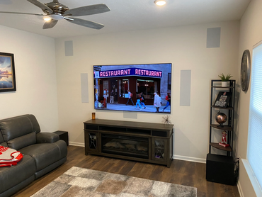 TV Mounting & Surround Sound Installation in Cincinnati, Ohio with in-wall speakers.