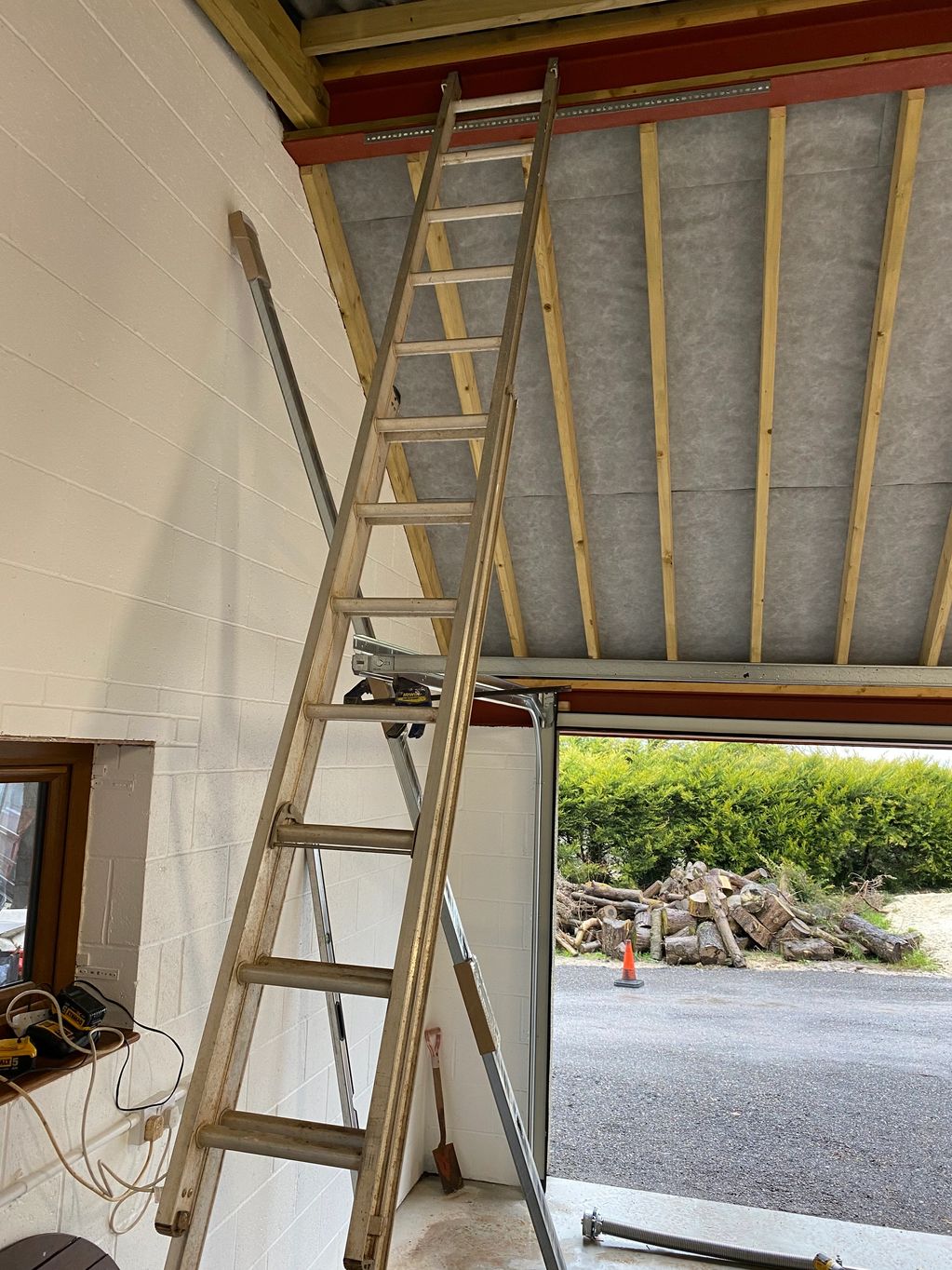 Installing the tracks on a Hormann sectional garage door with a very high ceiling