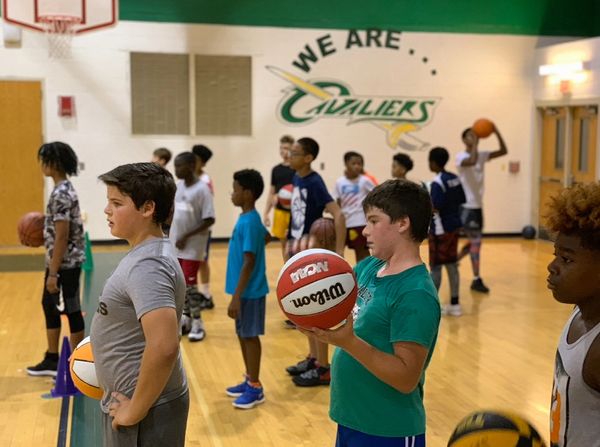 Kids playing a Basketball