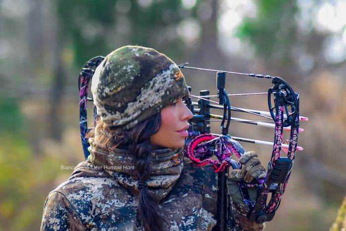 Female bowhunter