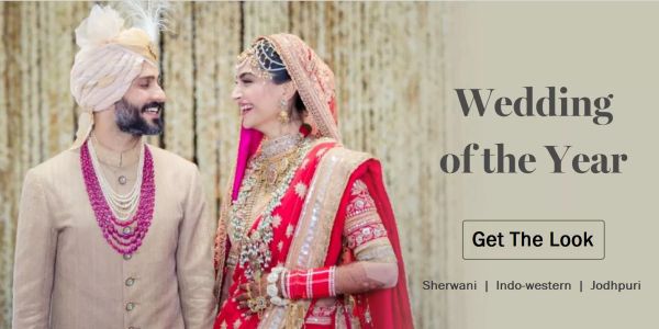 Indian bride and groom in traditional wedding attire.