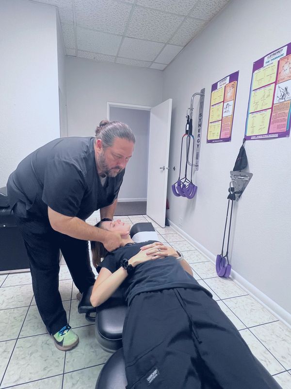 Dr. Blackburn performing a Cervical Adjustment in our South Lakeland Location. 