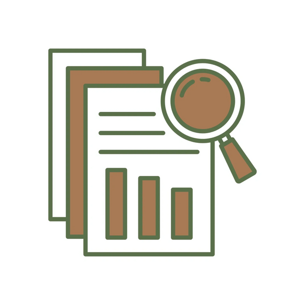 Magnifying glass examining documents with bar charts and text.
