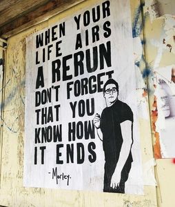 Street art poster with a motivational quote.