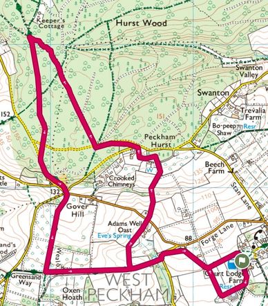 Map showing a marked walking route through West Peckham and Hurst Wood.