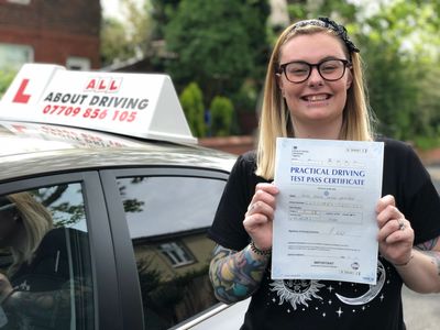 Jodie with her pass certificate, after doing an intensive course. 