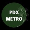 Logo with 'PDX METRO' text inside a dark green circle with abstract designs.