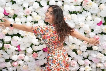 Bloom Petal Bliss Flower Wall testing the photo shots for our photo favors