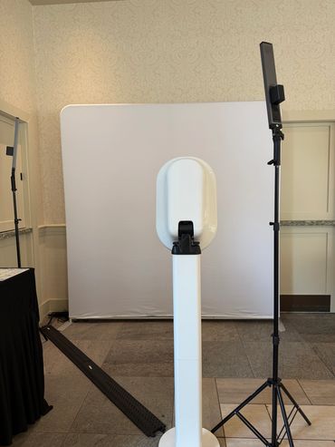 Photo Booth Set-up With Our All White Back-drop and our two wand studio lighting
