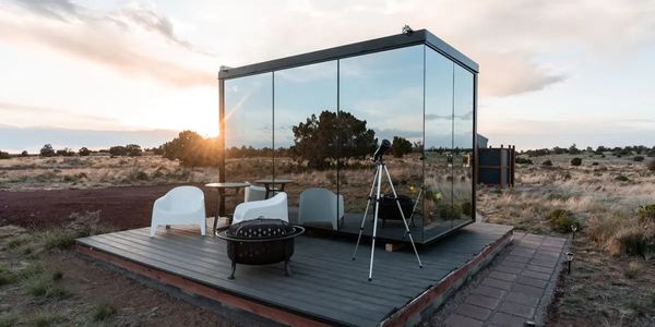 tiny mirrored home in high desert daylight setting. Unit # 3