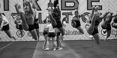 Jump Class for all ages to learn technique and strength for higher cheerleading and dance jumps.