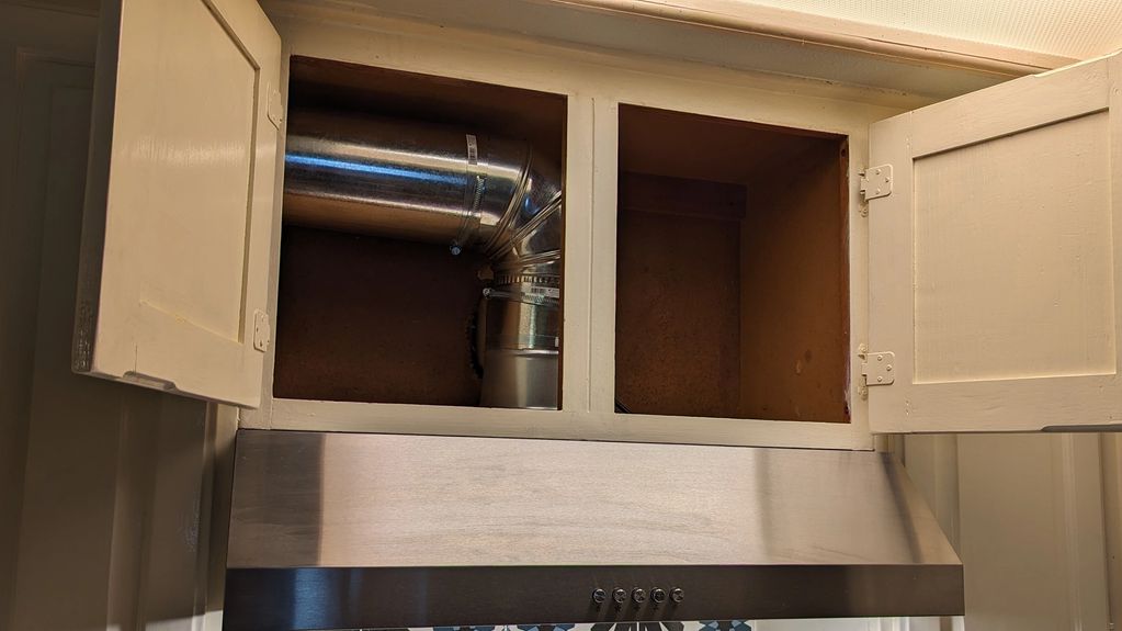 Considerate Handyman image of custom kitchen vent hood install. New ductwork in historic San Antonio