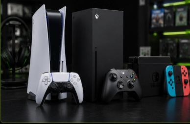 PlayStation 5, Xbox Series X, and Nintendo Switch consoles with controllers.