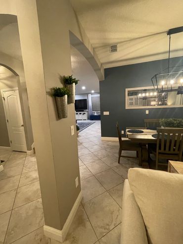 Home interior with a dining area and living room.