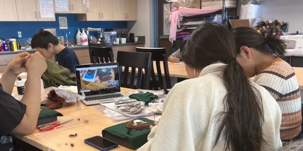 Students engaged in online felting workshop 