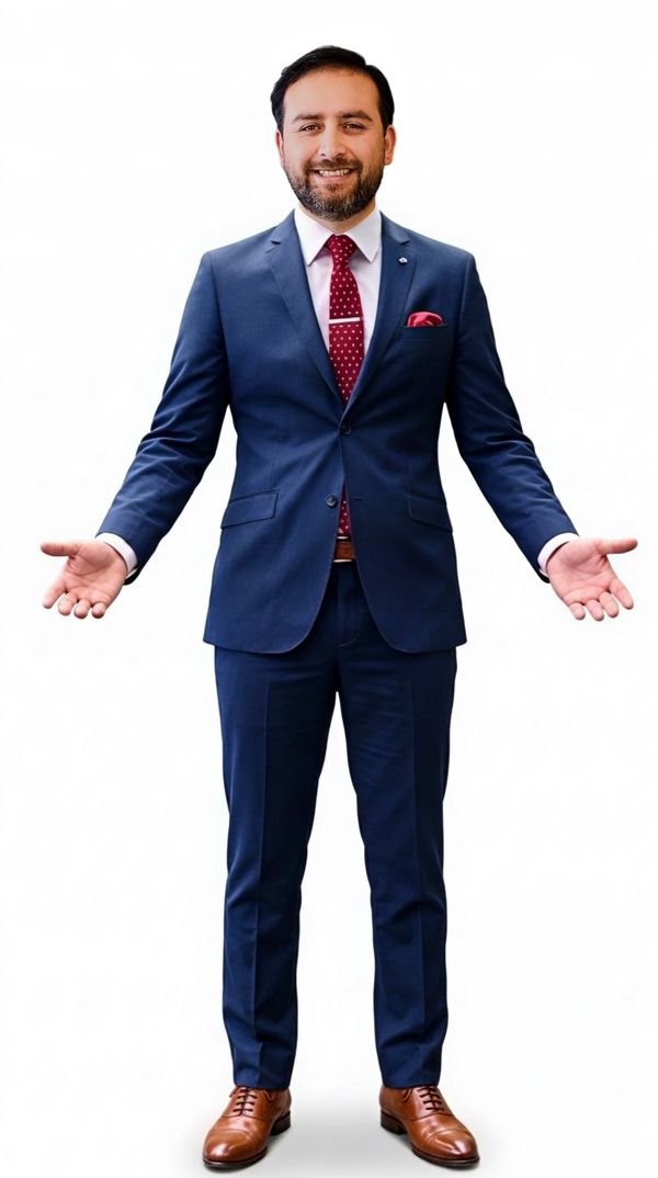 Smiling man in a blue suit with open arms.