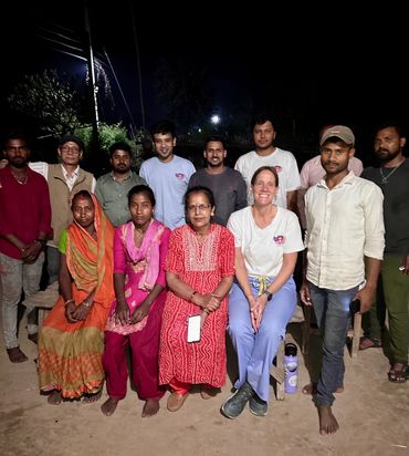 Group photo of foundation members, volunteers and host family.