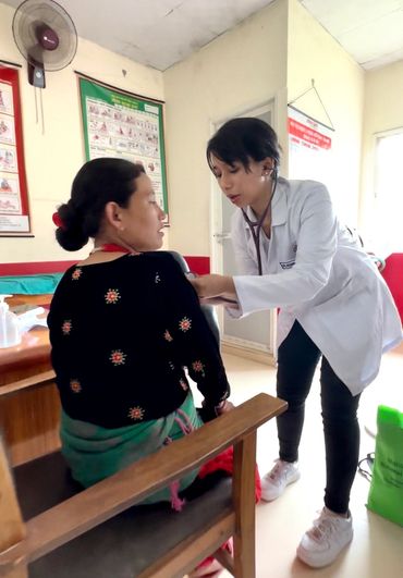 Doctor Rebina Shresta examining a patient