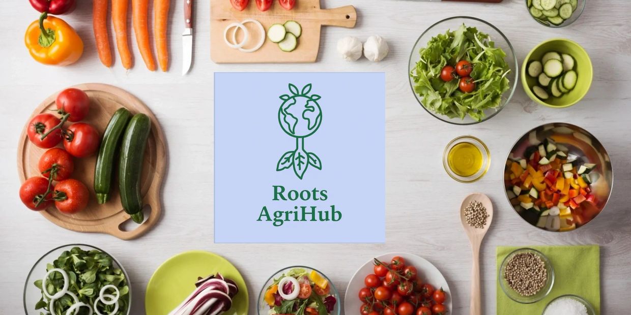 Fresh vegetables arranged around the Roots AgriHub logo on a white table.