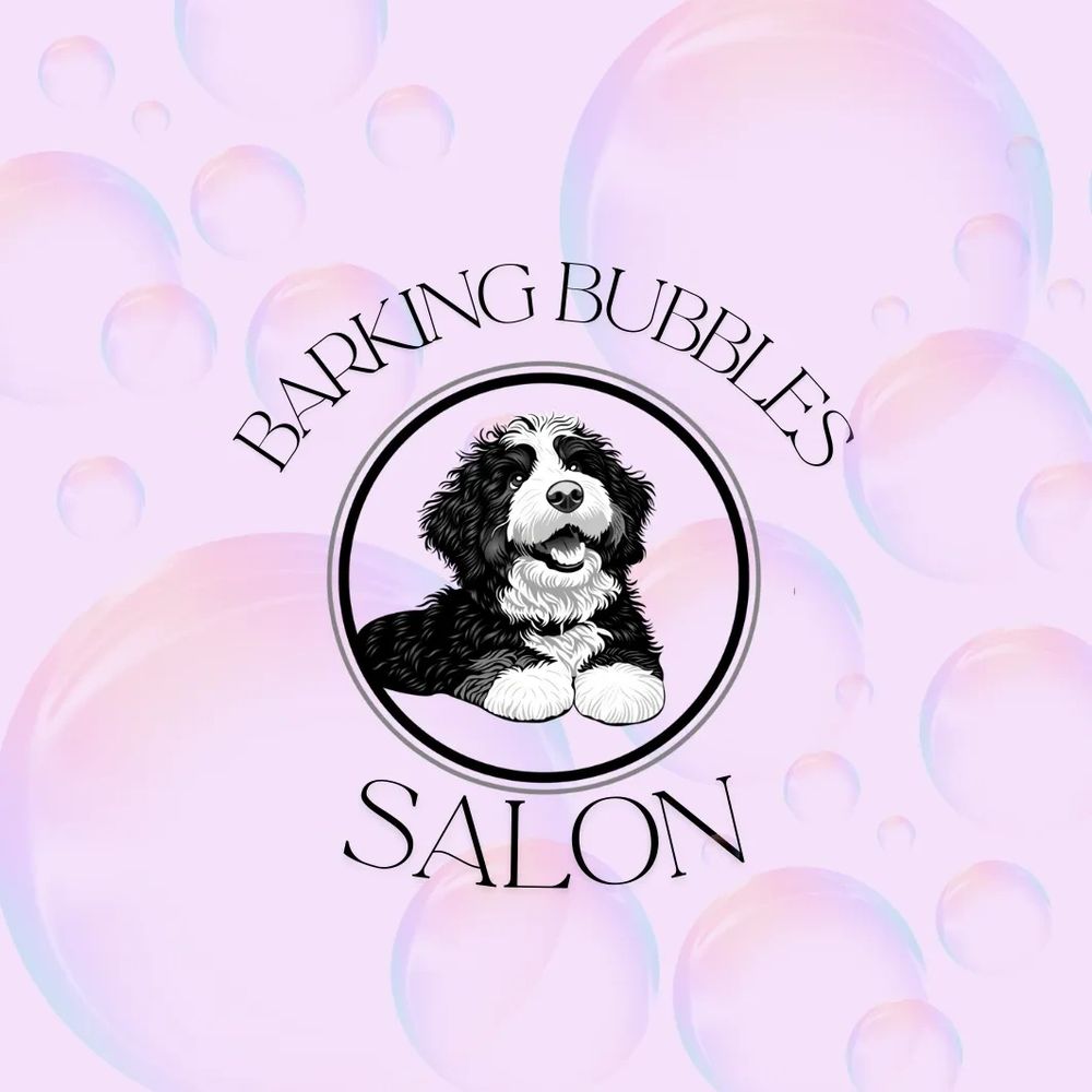 Logo for Barking Bubbles Salon featuring a happy dog and bubble background.