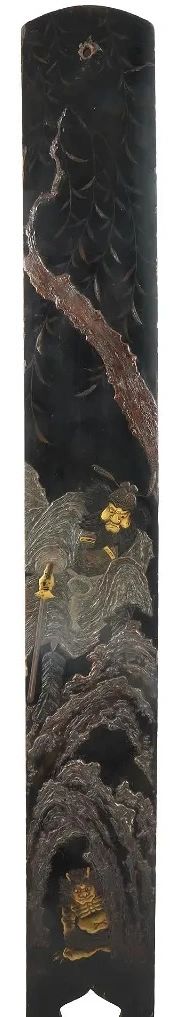 Wall or Pillar hanging in Choshitsu (high relief) lacquer, depicting Shoki (the demon queller) menacing a hiding Oni, 150cm x 18cm. Ogawa Haritsu (Ritsuo) School. Edo era
