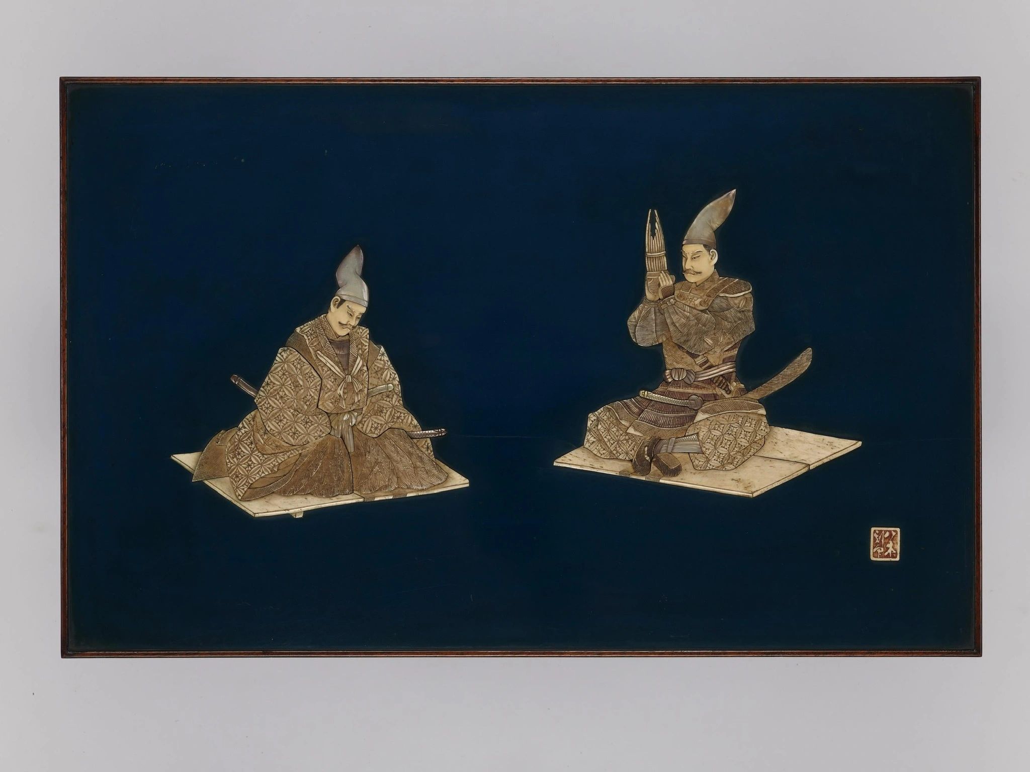Shibayama panel depicting Minamoto-no-Yoshimitsu teaching the Sho to Toyohara-no-Tokiaki. Signed by