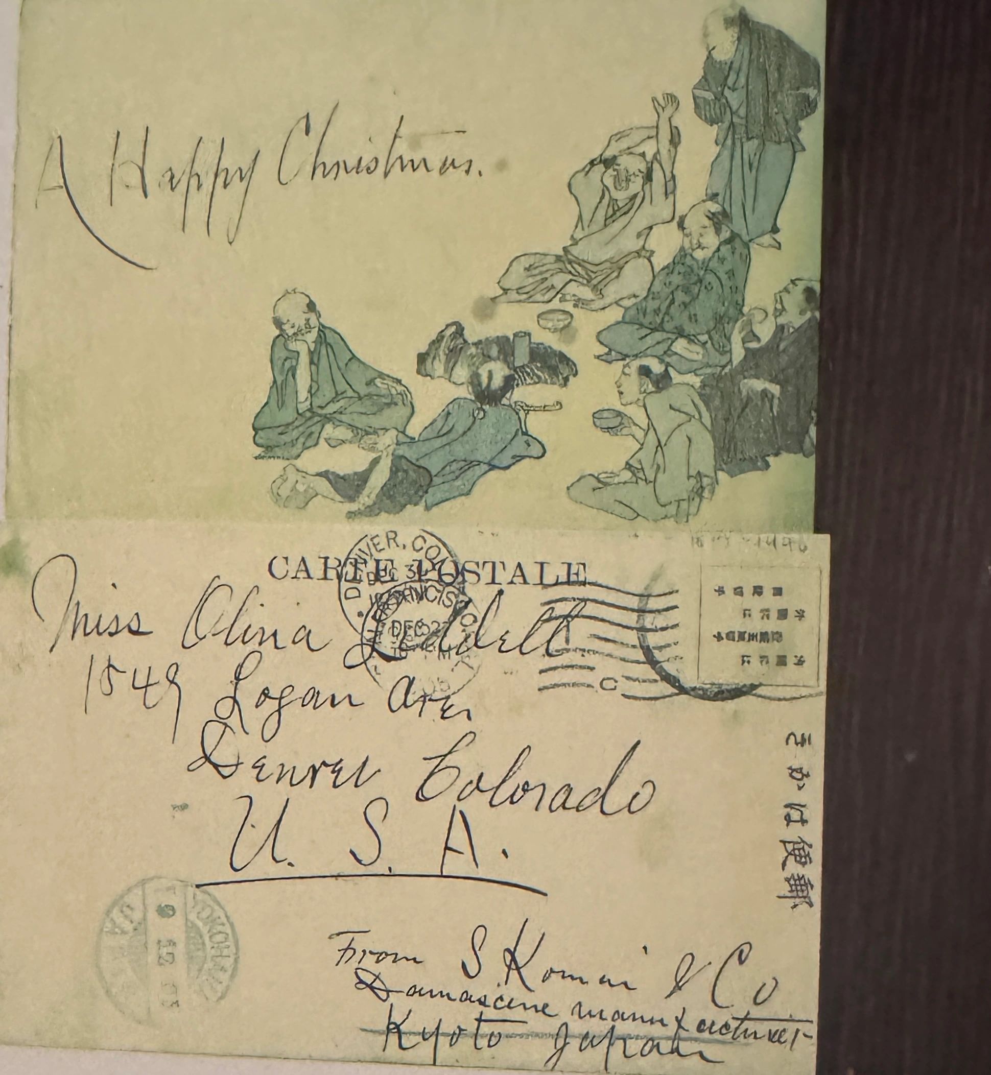 S. Komai & Co., Damascine manufacturers. Christmas card depicting workers relaxing with sake. Postcard sent to Miss Olivia Liddell, a frequent purchaser of Komai products.