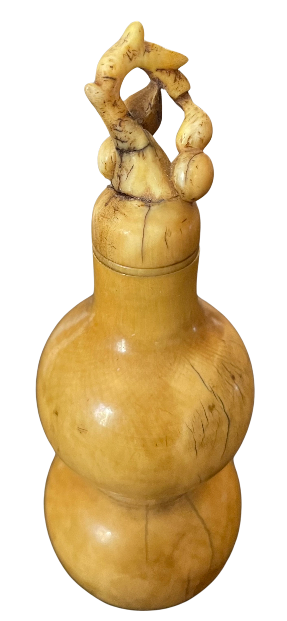 Ivory medicine or snuff bottle, in hulu form, the double gourd completely hollowed out. Ming dynasty