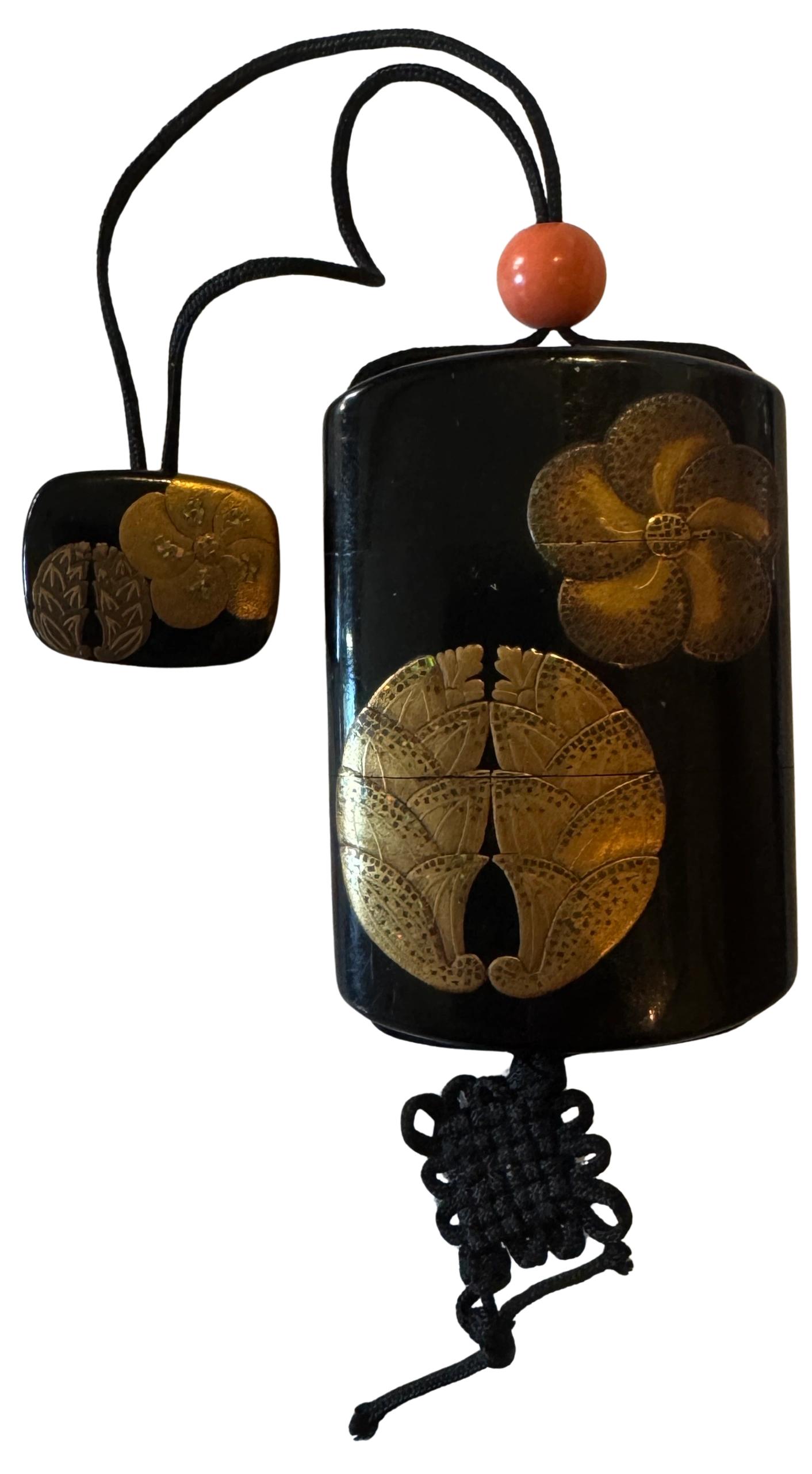 Inro decorated with gold & silver maki-e, mother of pearl hirameji & okibirame on a roiro-nuri ground, depicting flying mons. Matching netsuke & a coral ojime. Signed by Gyokuko on base and Kiyofu on side. Meiji era.