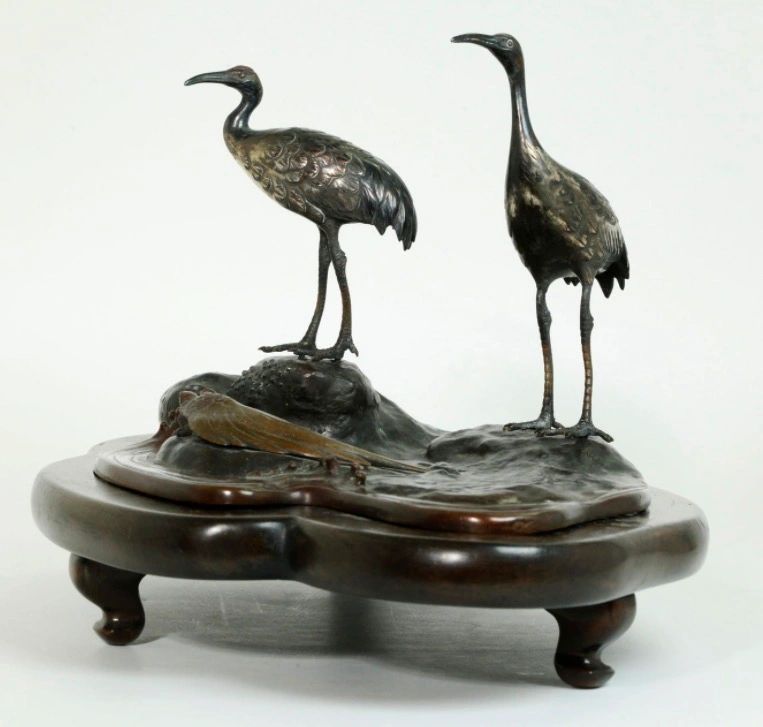 Bronze okimono depicting cranes and a turtle. Seal mark of Seiji Saku, Meiji era.