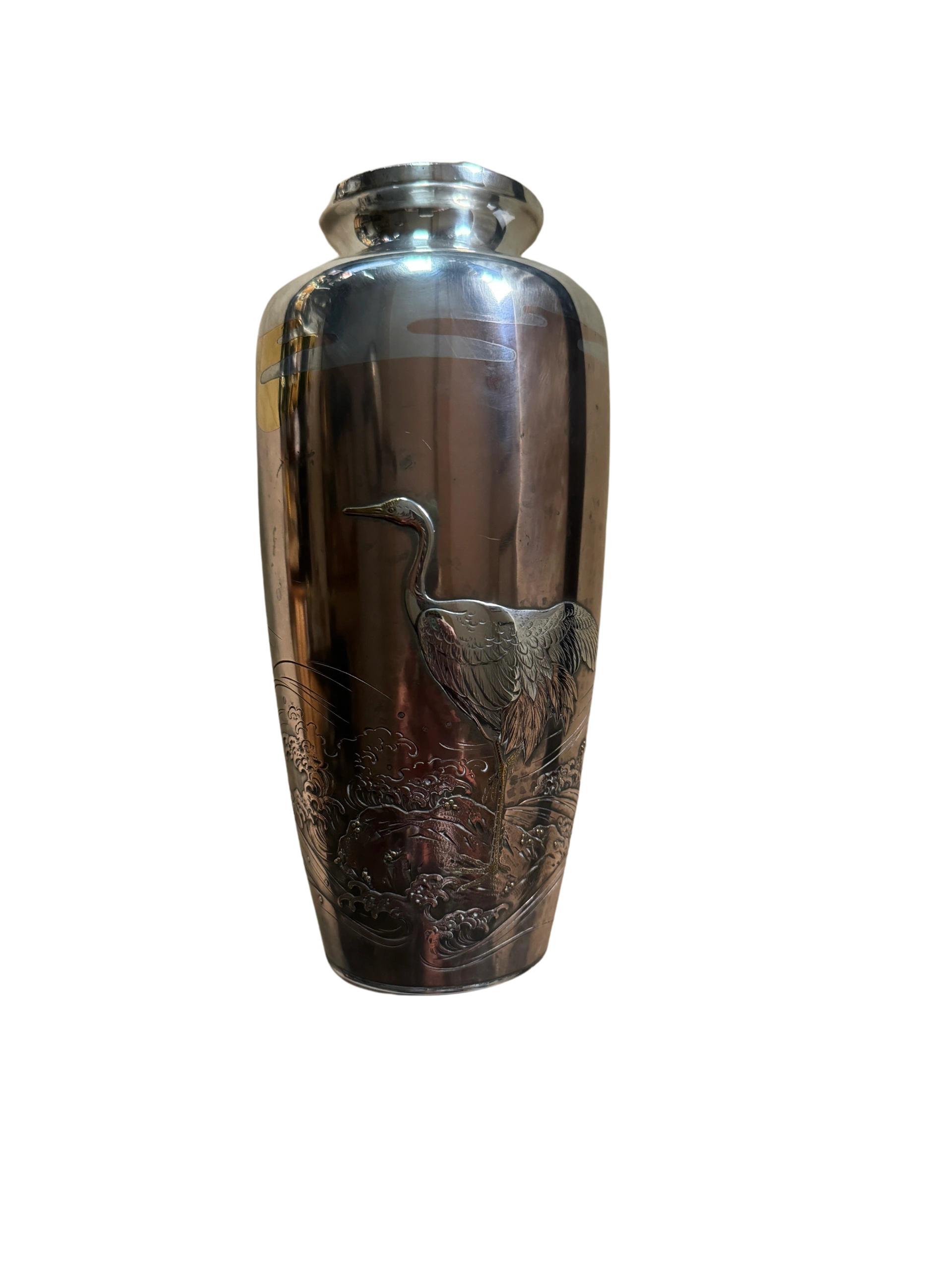 Silver vase decorated in kebori, hirazogan and takazogan with pure gold accents and a partial shibuichi ground. Signed Yoshiyama Zo with Maki studio seal. Meiji era.