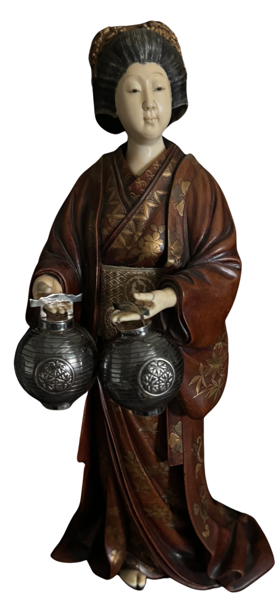 Carved wood Geisha wearing Tokugawa kimono holding silver lanterns. Signed Miyao in a mother-of-pearl reserve, Meiji era.