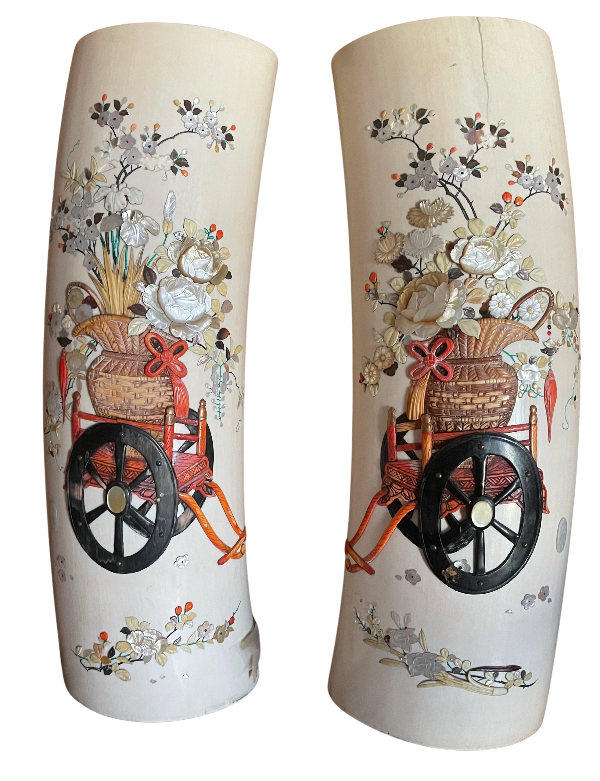 Shibayama tusks depicting hanaguruma (flower carts) by Masa Yasu, Meiji era.