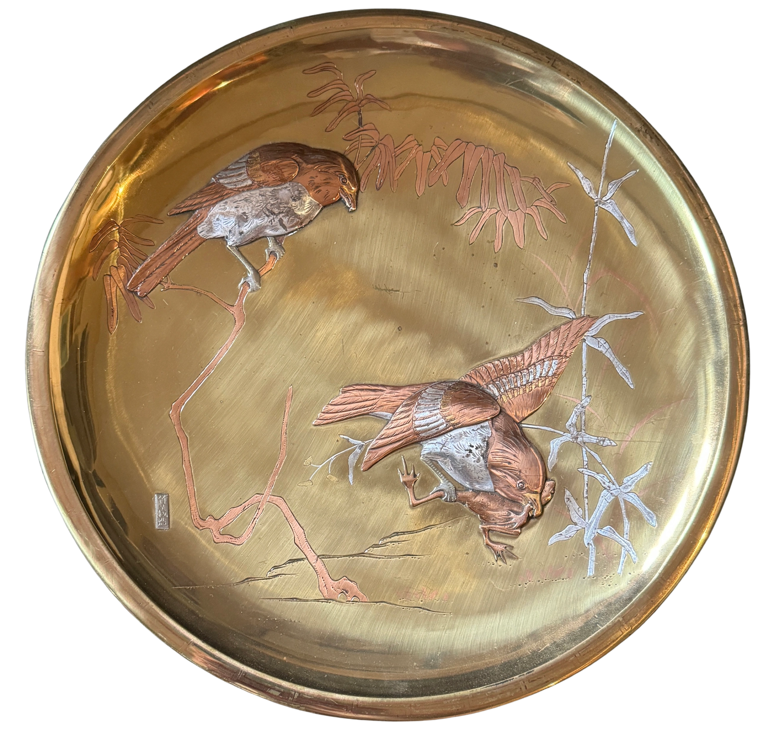 Cuckoos catching a frog. Mixed metal dish, signed Takeyoshi Zo, in a silver reserve. Meiji era.