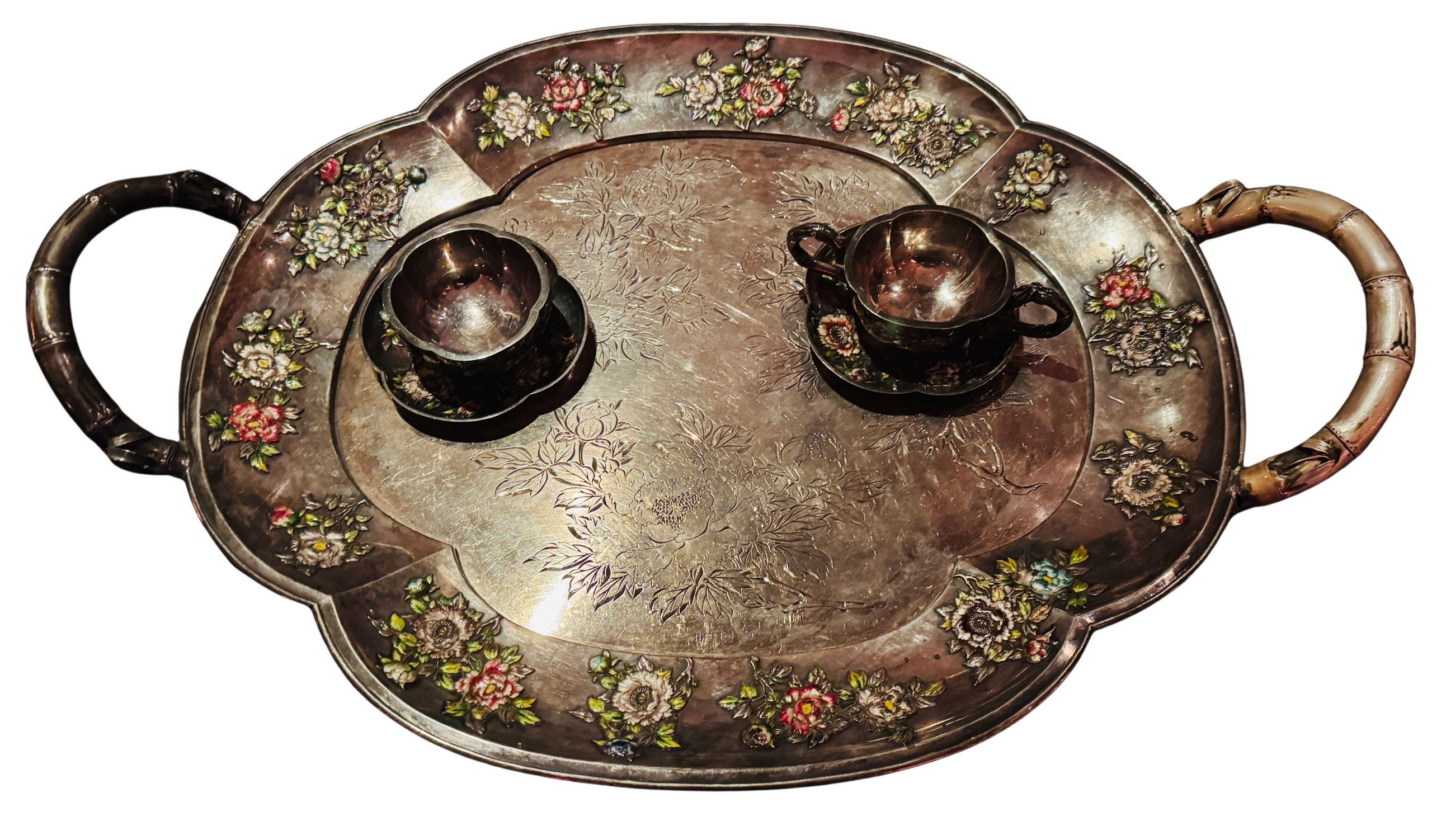 Enameled cups & saucers on an engraved silver tray, 60cm across, weight - 3200 grammes. Meiji era.