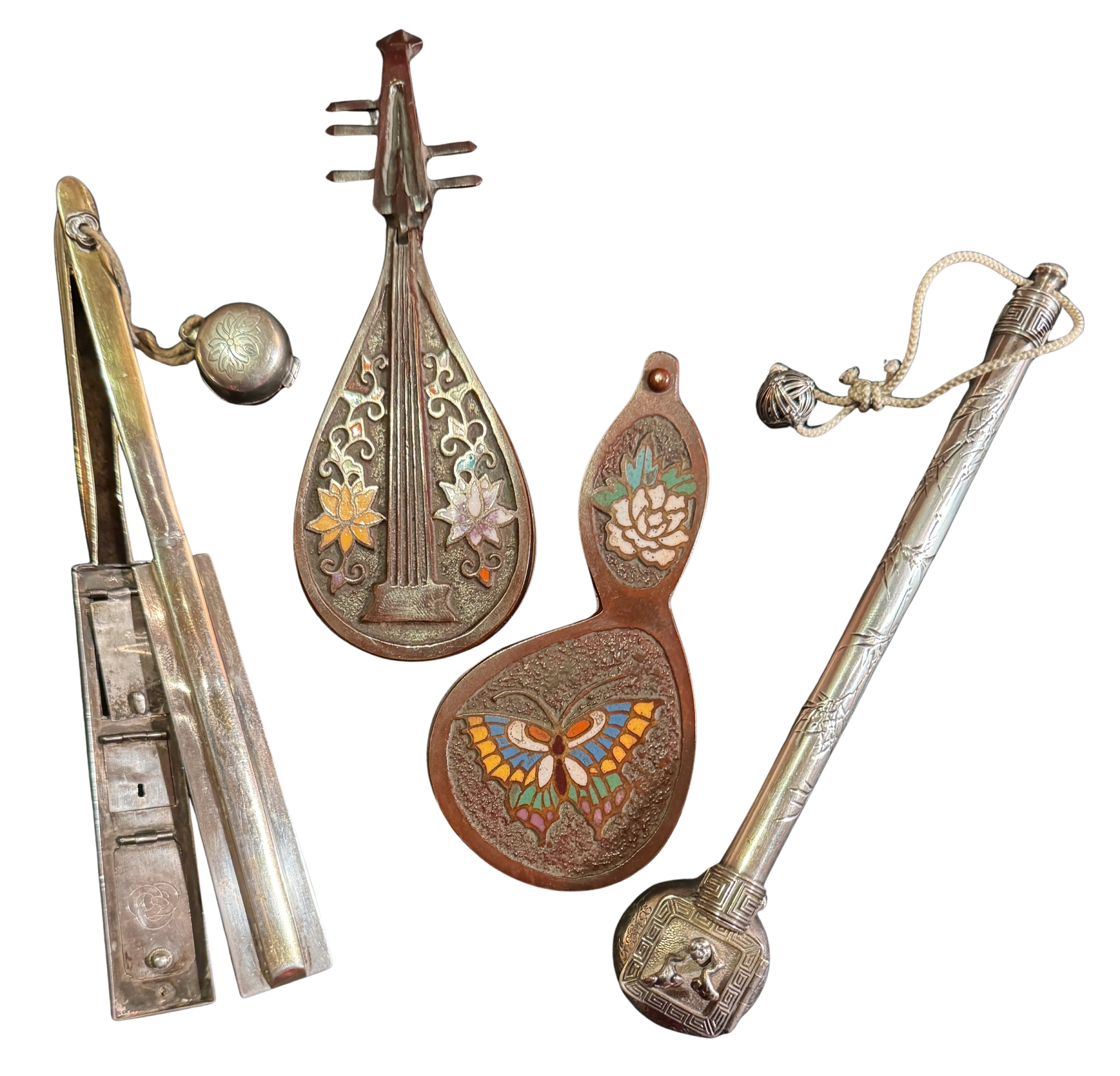 Yatate (pen & ink holder) group. Two in Zogan Shippo cloisonné enamel, one a biwa (short necked lute), the other a Hyotan (gourd), Hirata school, Edo era. Also two silver yatate, a sensu (fan) with ink dropper Ojime and another signed by Masakazu Toshizo with a Meiji seal. Meiji era.