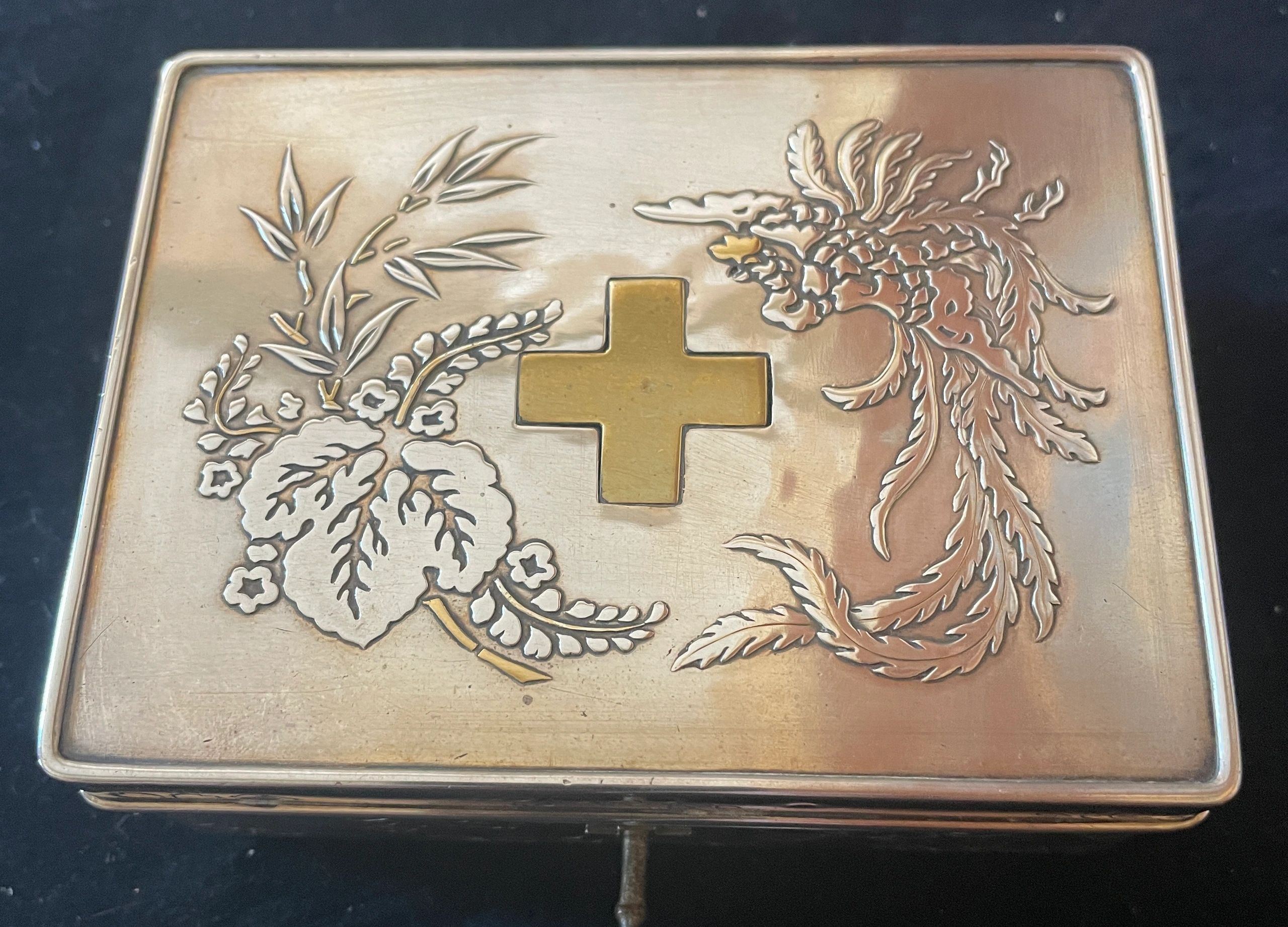 Silver presentation kobako commemorating the Japanese Red Cross Society. Signed Koji Saku for the Tenshodo Company.